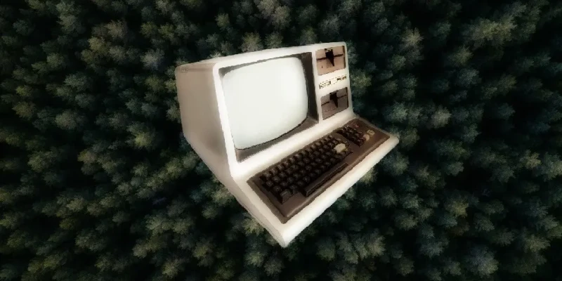 Ordinateur des années 1970 face à une canopée vue du ciel